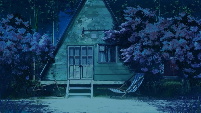 Everlasting Summer A-frame cabin at night with bicycle