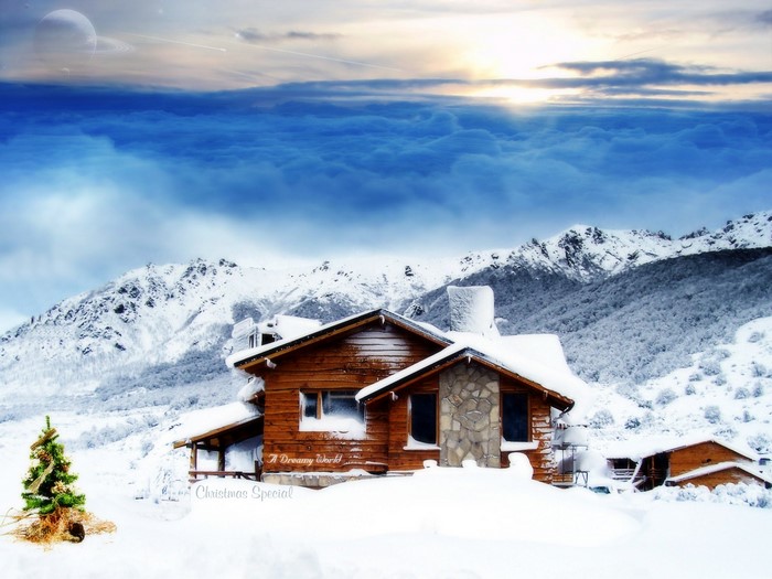 Snowy cabin in mountains with Christmas tree and celestial bodies