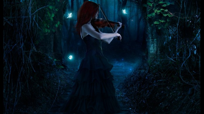 Woman playing violin in a dark forest with fairies