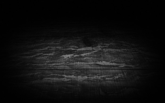 Dark wooden floor with abstract light patterns