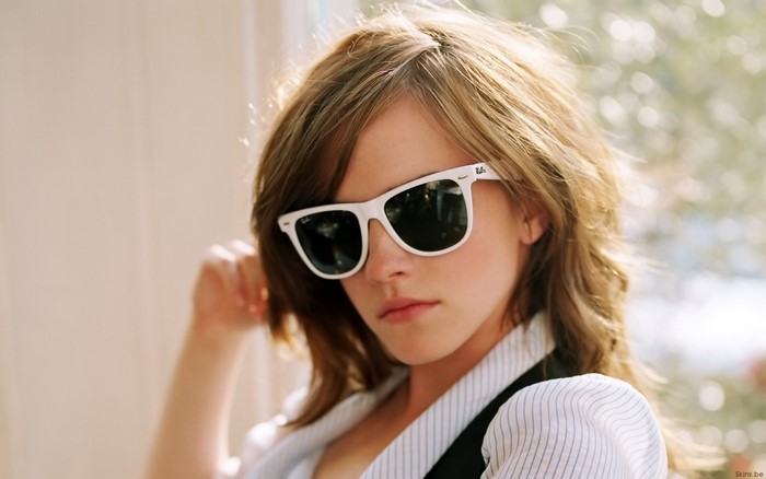 Emma Watson wearing white Ray-Ban sunglasses