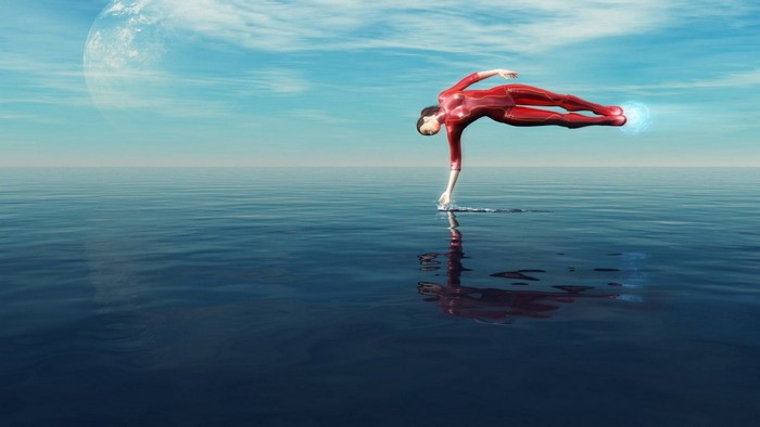 Person in red suit balancing on water with planet in sky