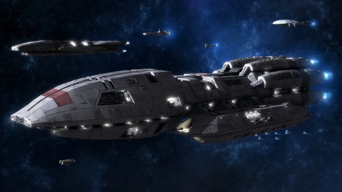 Battlestar Pegasus and fleet in outer space