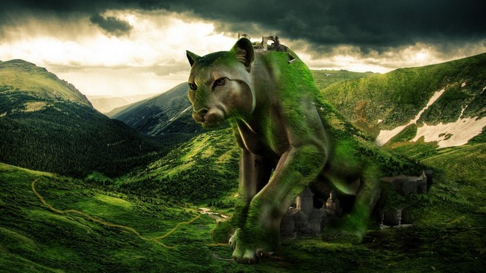 Giant green cougar creature in a mountain landscape