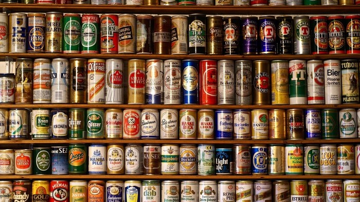 Shelves filled with various beer cans