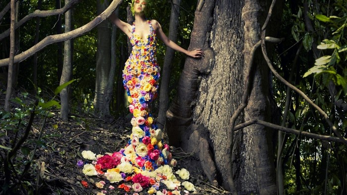 Woman in floral dress in a forest