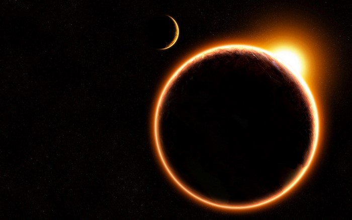 Digital art of a planet and moon during an eclipse