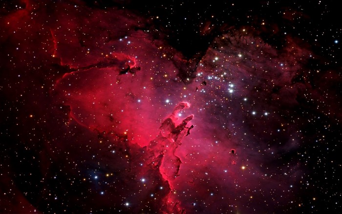 Pillars of Creation nebula in space with stars