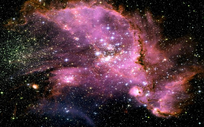 Pink and purple nebula with stars in outer space