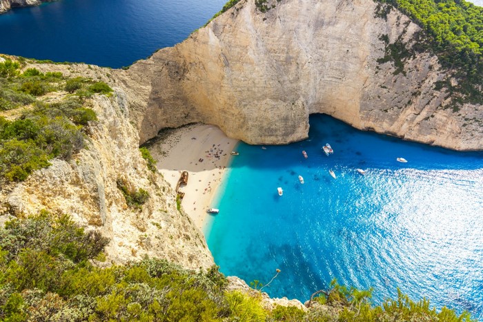 Navagio Beach Zakynthos Greece with shipwreck and boats