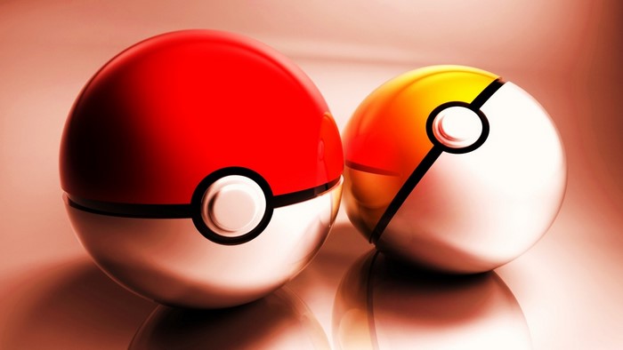 Two Pokemon Pokeballs close up
