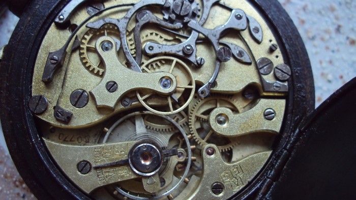 Close-up of a vintage pocket watch mechanism