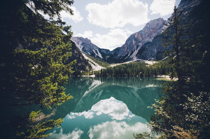 Lake reflection of mountains and trees