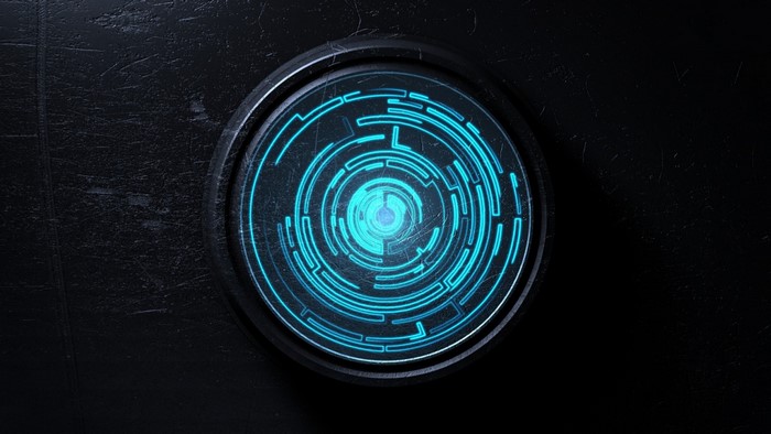 Blue circular maze on dark textured surface