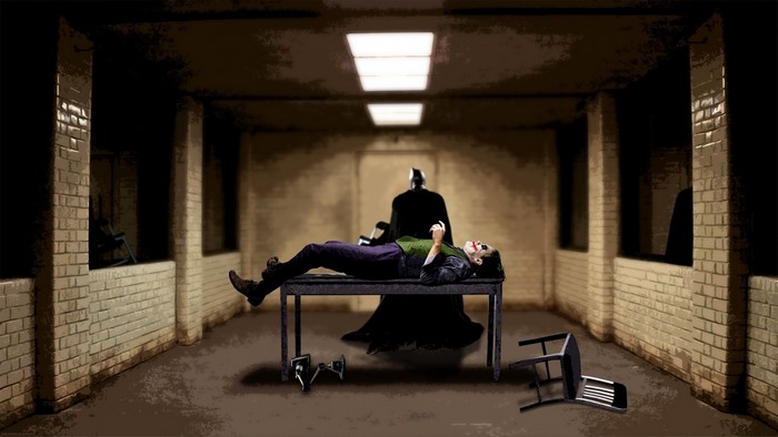 Batman and Joker in a dark room