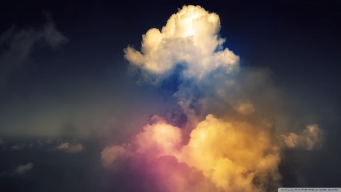 Sunlight illuminating colorful clouds in the sky