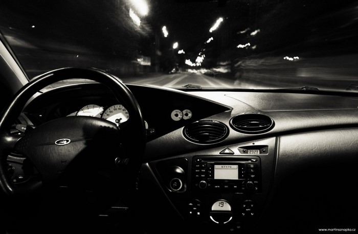 Interior view of a Ford Focus driving at night