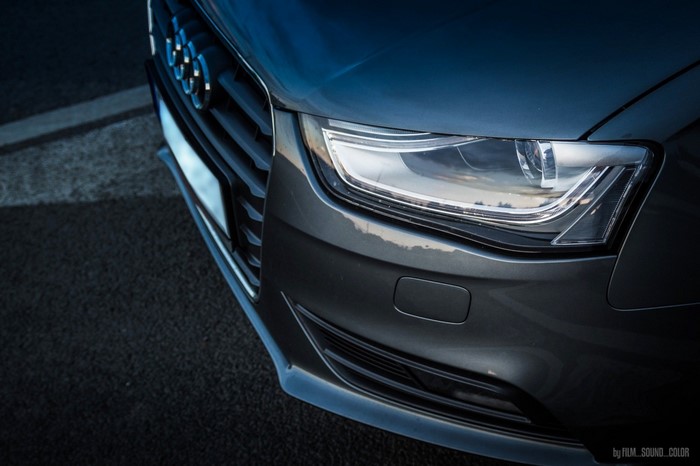 Audi car front grille and headlight close-up