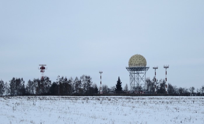Winter landscape with radar domes and towers