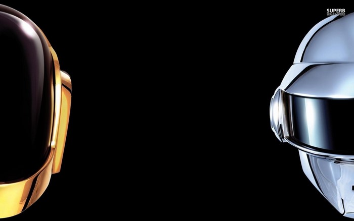 Daft Punk helmets, gold and silver, against black background