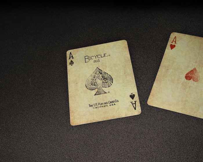 Ace of Spades and Ace of Hearts playing cards