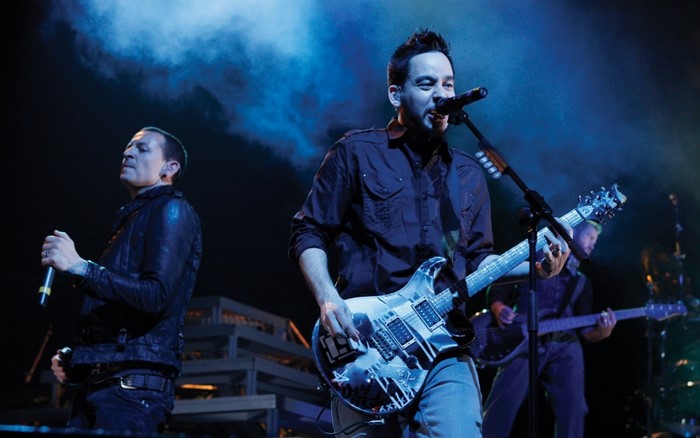 Linkin Park band members performing on stage