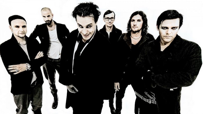 Rammstein band members posing for a photo