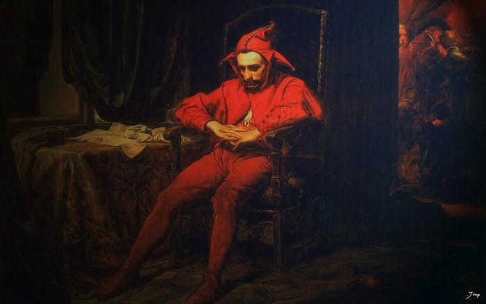 Painting of a sad jester in red