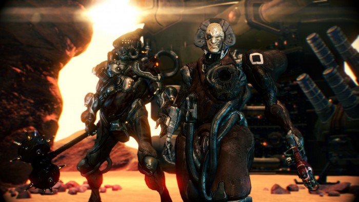 Two Grineer characters from Warframe in a desert environment