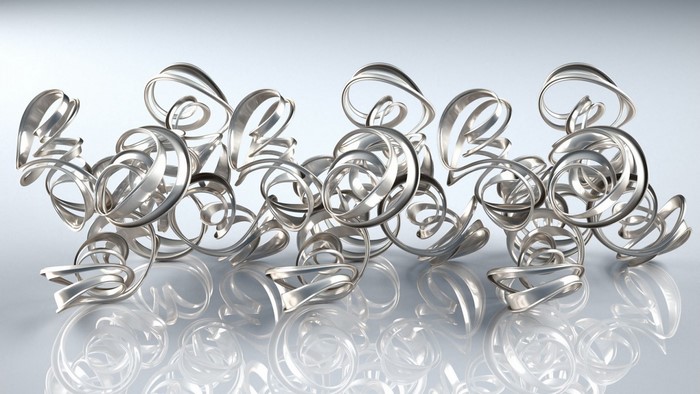 Abstract silver metal sculpture with reflections