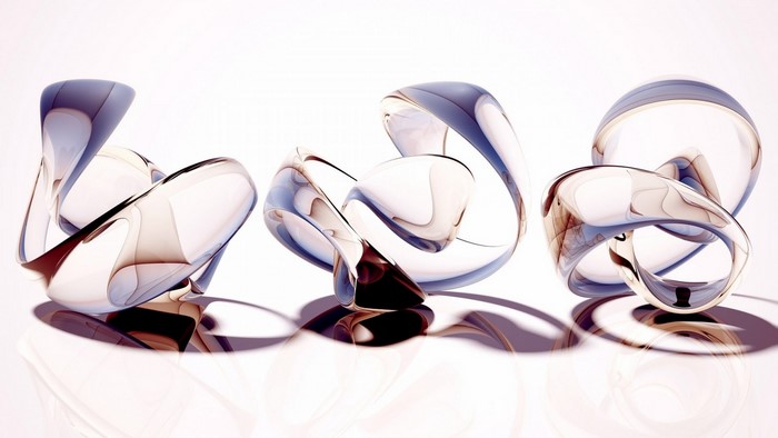 Abstract 3D glass sculptures on a white background