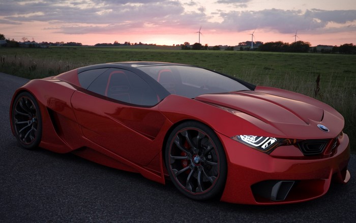 Red BMW sports car on a road at sunset