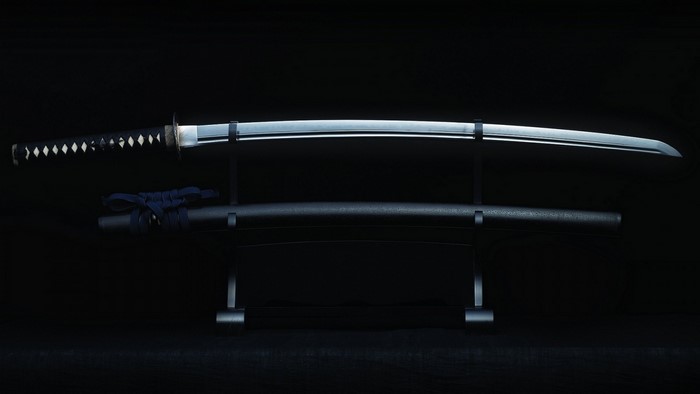 Katana sword and scabbard on a stand