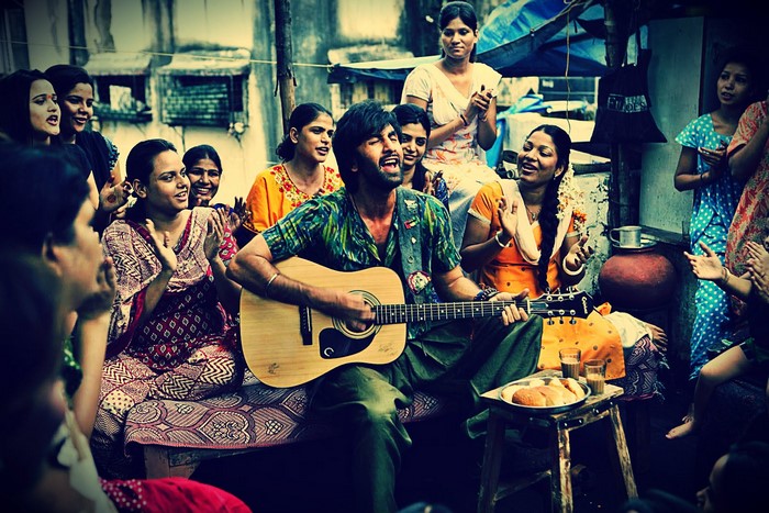 Ranbir Kapoor performing music with an audience