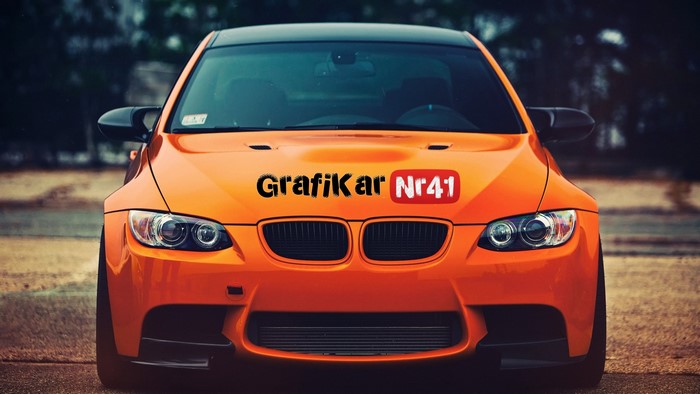 Orange BMW M3 Coupe with GrafiKar Nr41 logo