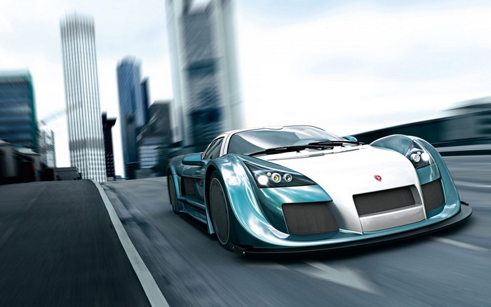Gumpert Apollo supercar driving on a city street
