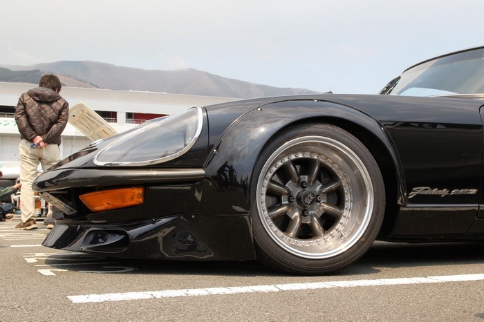 Black Datsun 240Z with custom wheels
