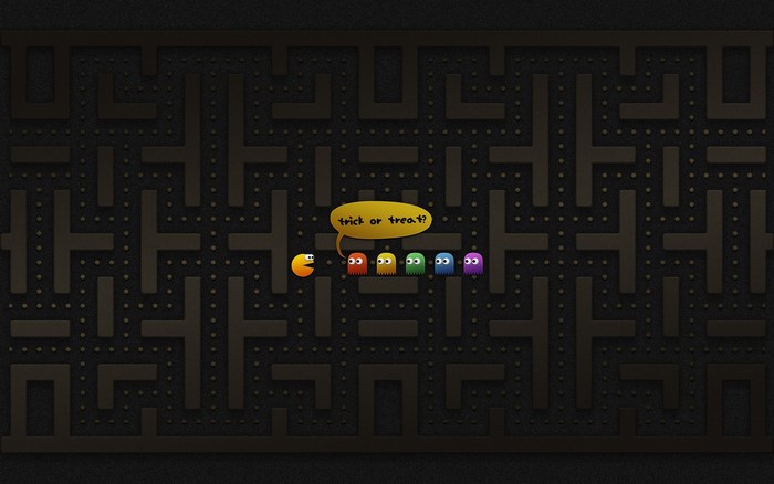 Pac-Man and ghosts in a maze with text