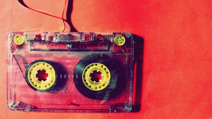 Cassette tape on a red background