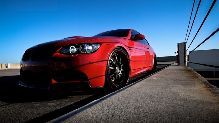 Red BMW M3 Coupe on a Rooftop