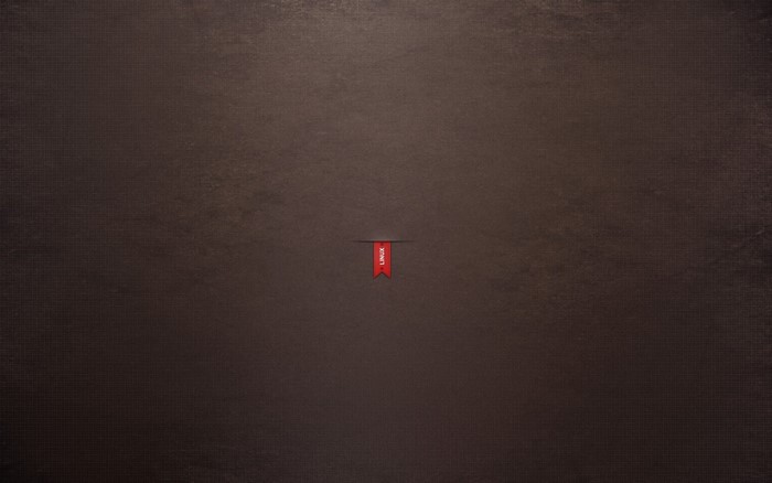 Minimalist Linux bookmark on textured background