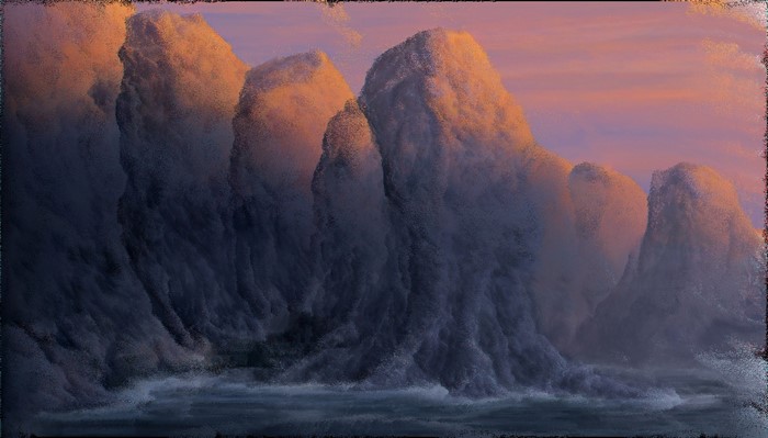 Waves crashing against rocky formations at sunrise