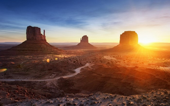 Monument Valley at Sunrise with Dirt Road