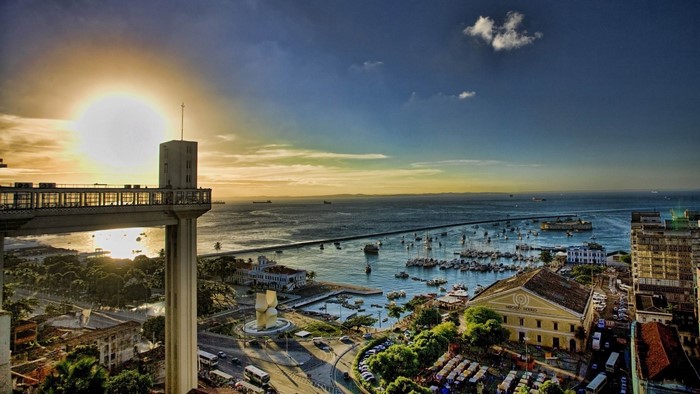 Elevator building overlooking a bay at sunset