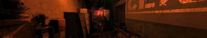 Dark corridor with red light and machinery