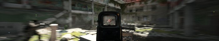 First-person view of a soldier aiming in a war-torn city