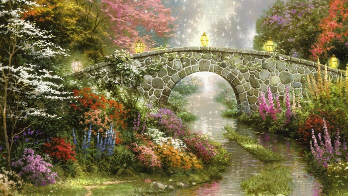Stone Arch Bridge Over a Tranquil Stream in Autumn Garden