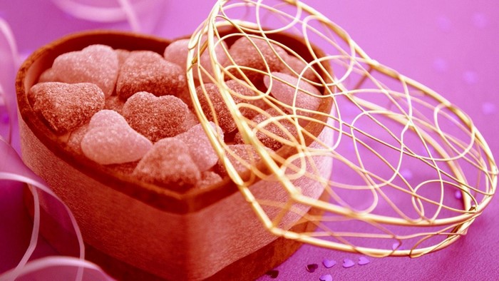 Heart-shaped box of pink heart-shaped candies