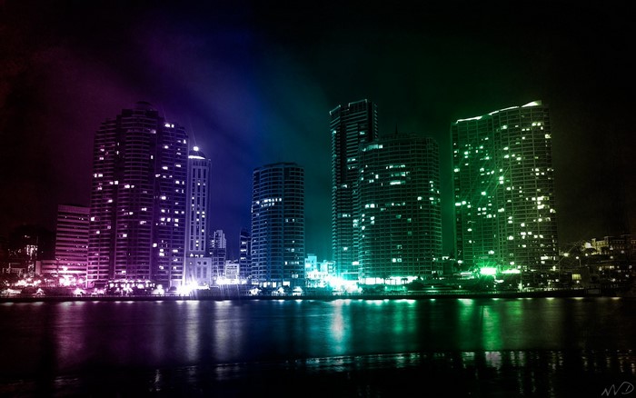 Colorful city skyline at night with reflections