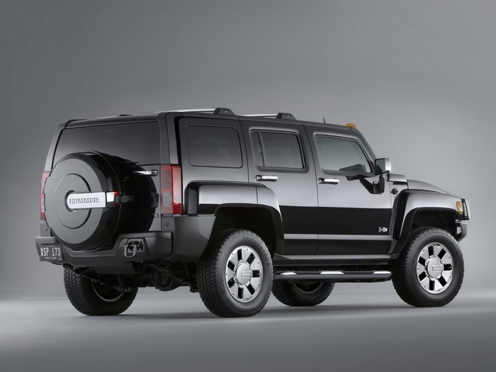 Black Hummer H3 SUV with spare tire